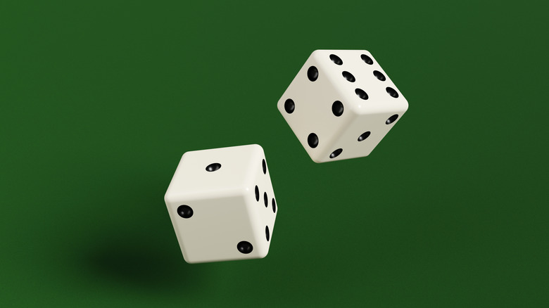 Dices over a green background